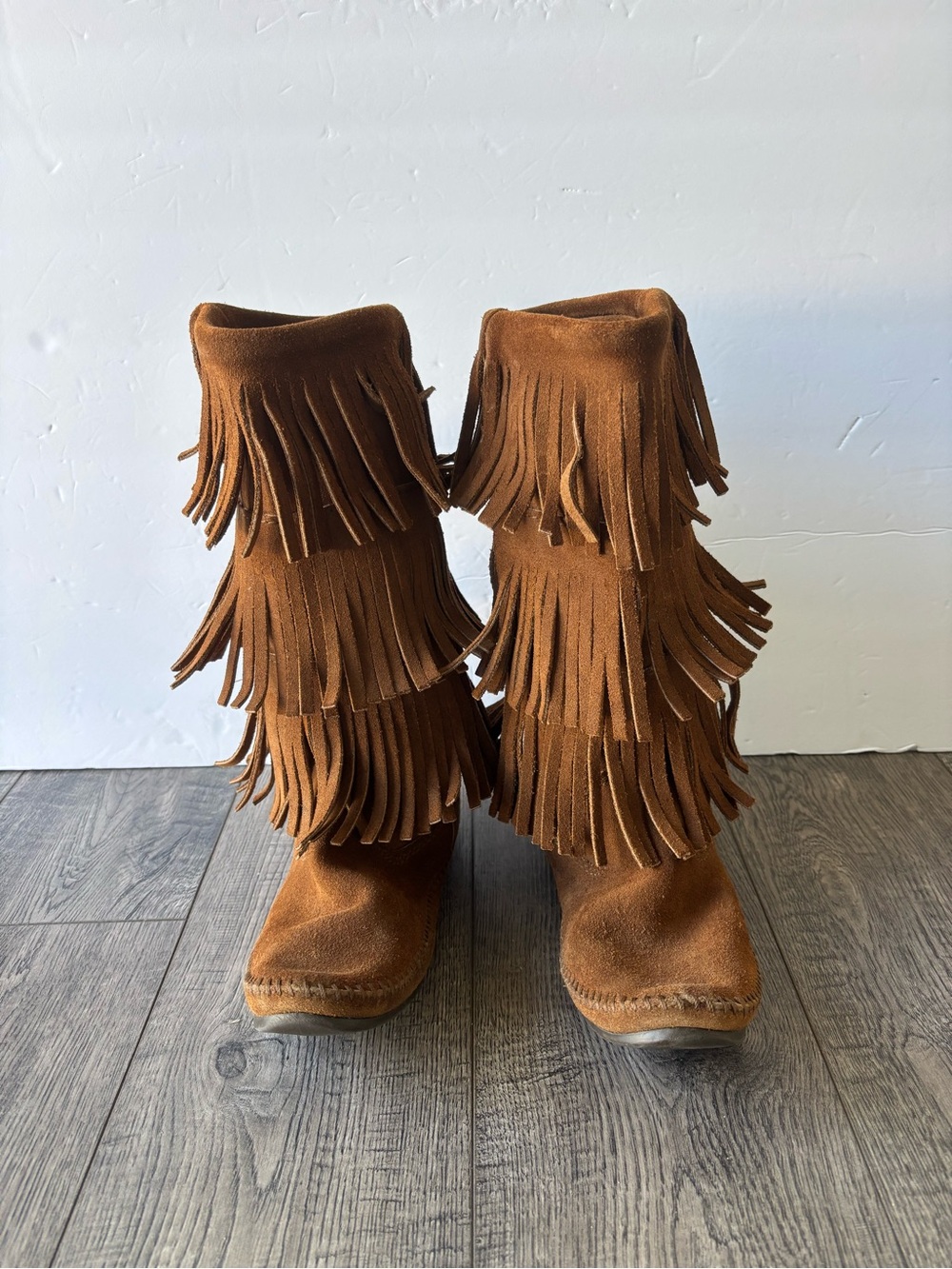 Minnetonka Triple Fringe Suede Lace-Up Boots in Brown
